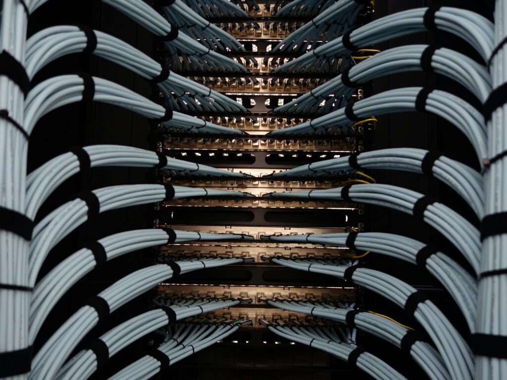pexels photo 19166565 19166565 Organized network server cables for efficient data management.