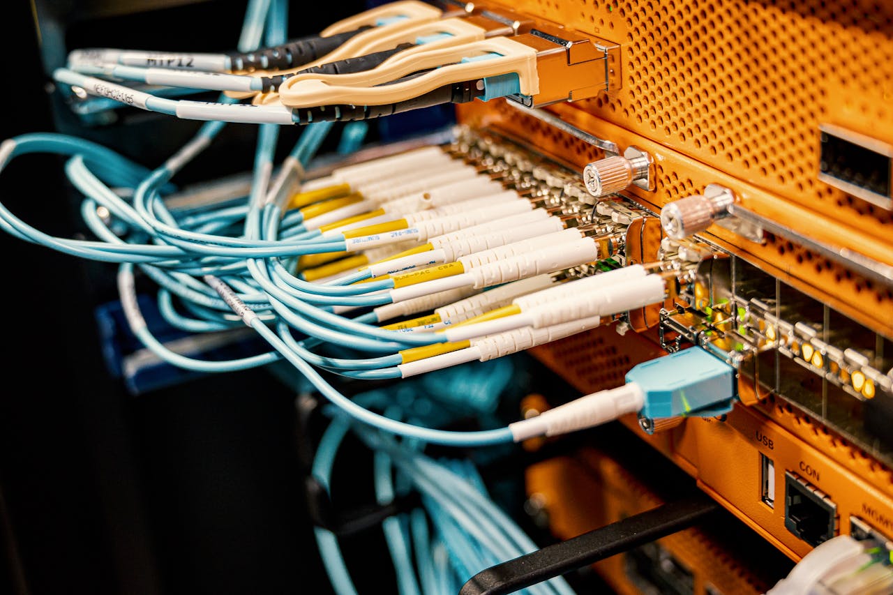 Home Modern hardware and structured cabling system with patch cords inserted into patch panel outlets