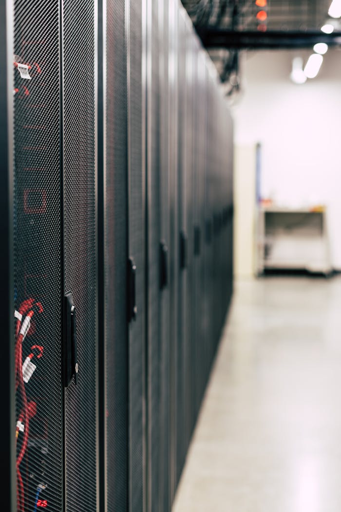 Home High-tech data center featuring multiple server racks with advanced equipment.